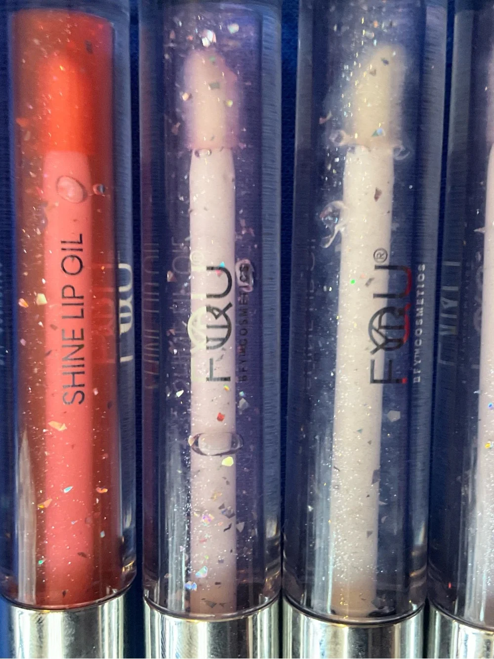 Fyrli Shine Lip Oil Trio — Coral, Lavender, Clear